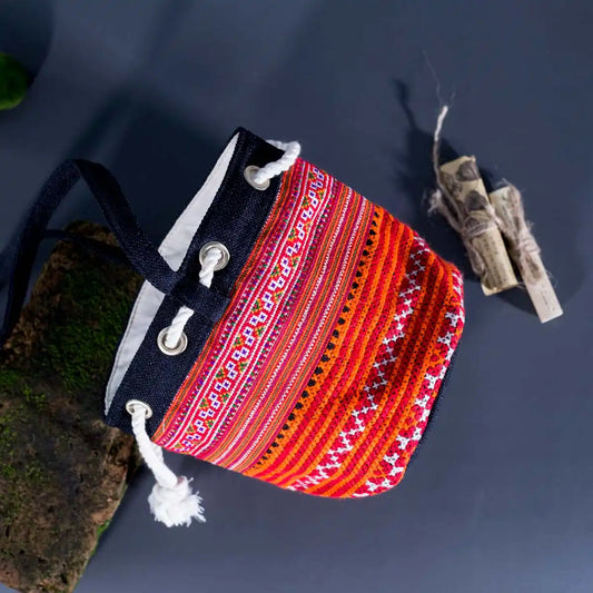 Vindigo orange hemp tribal bucket bag close-up embroidery detail