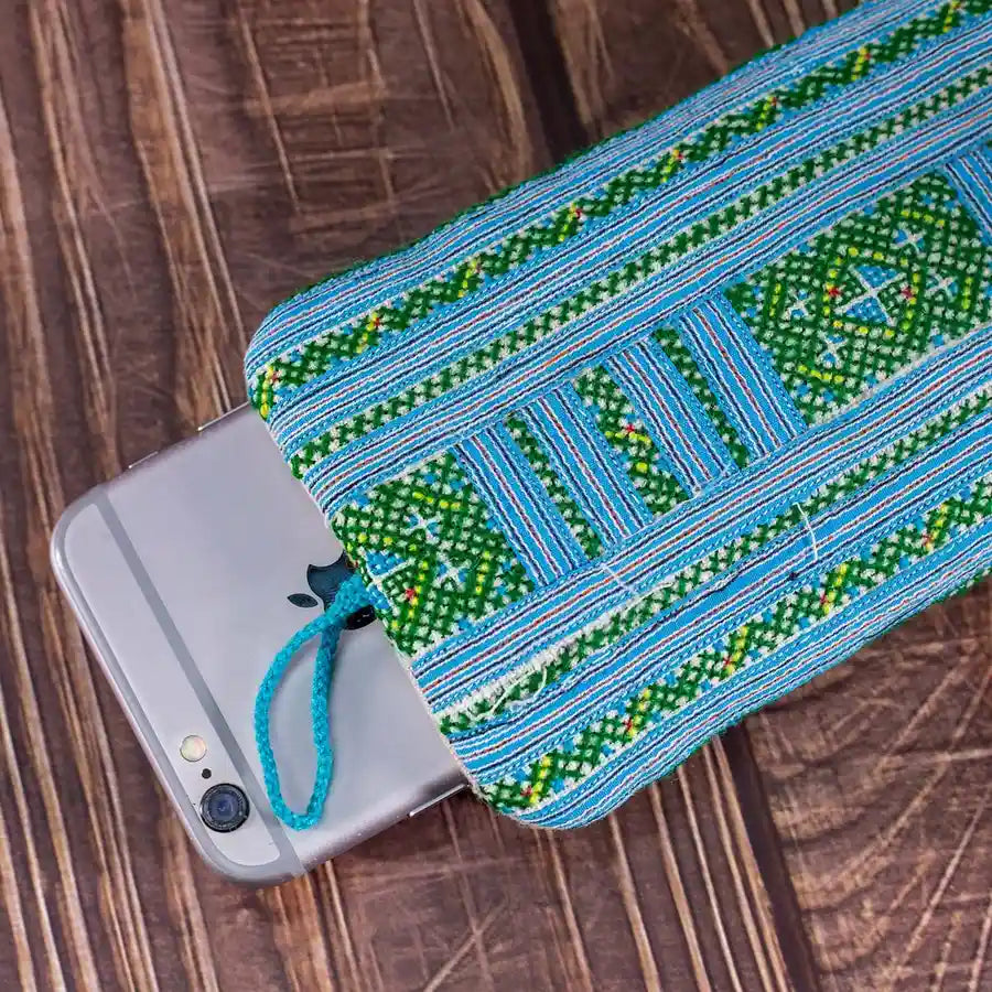 Vindigo embroidered phone case with phone partially inside