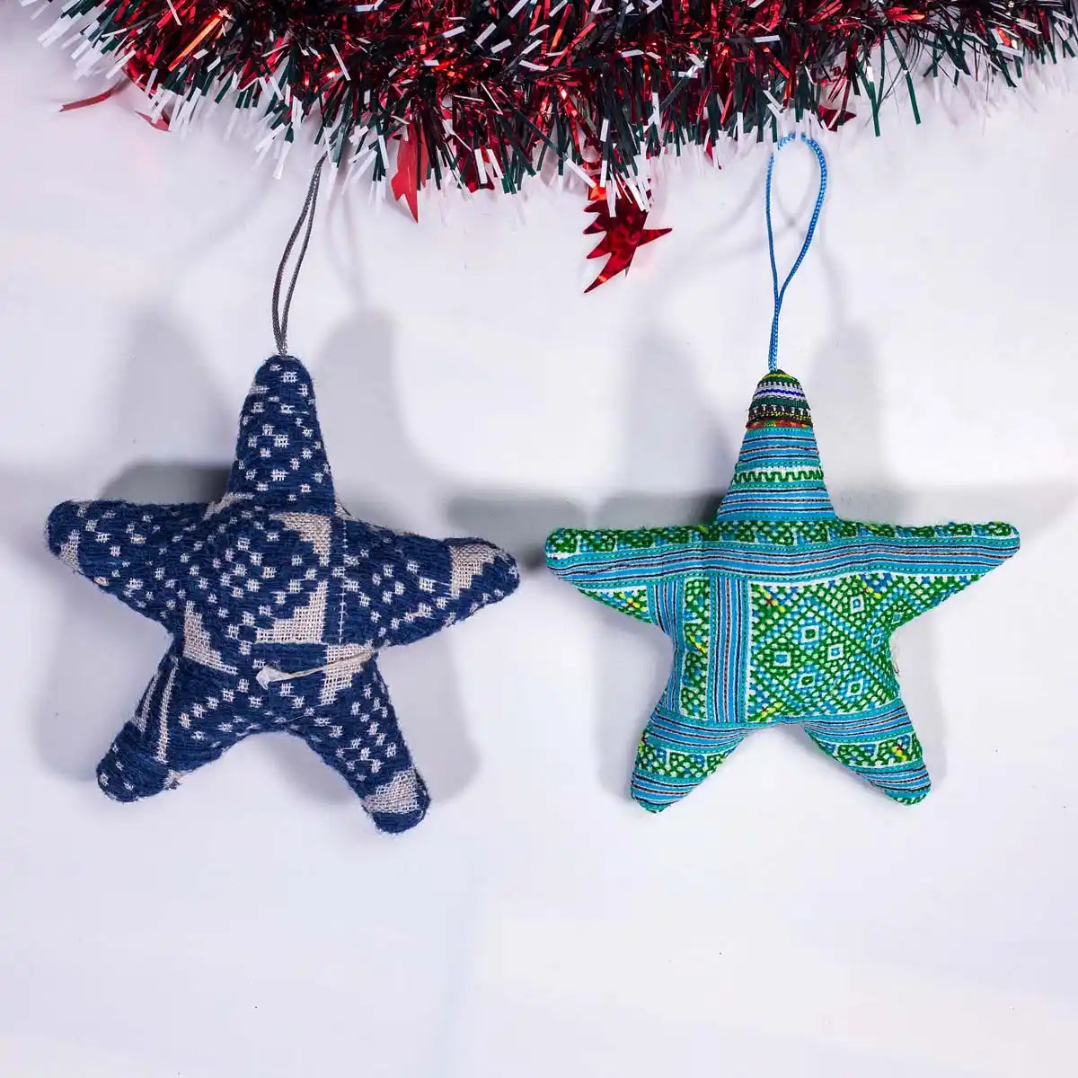 Vindigo blue and green tribal embroidered star-shaped ornaments hanging display