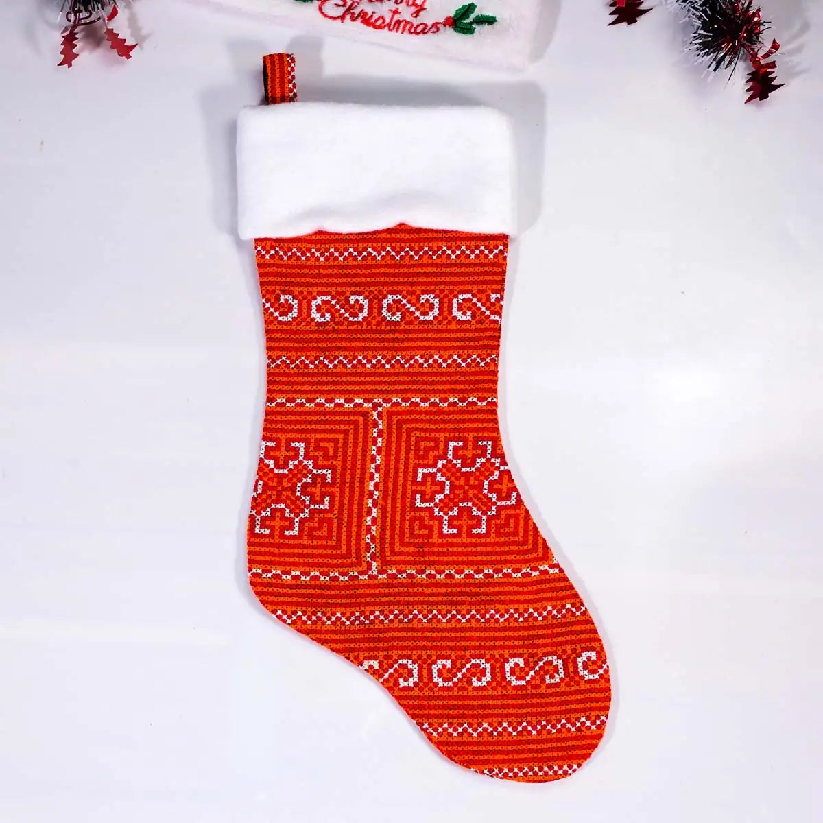 Christmas stocking with embroidered squares front view