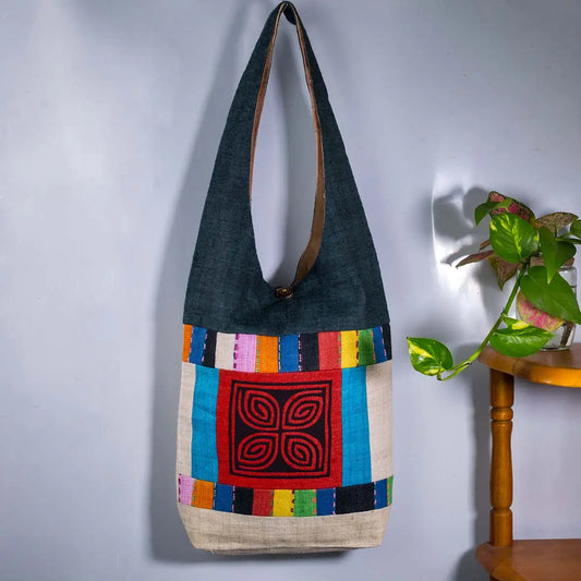Vindigo shoulder bag teal hemp red spiral patch hanging front view