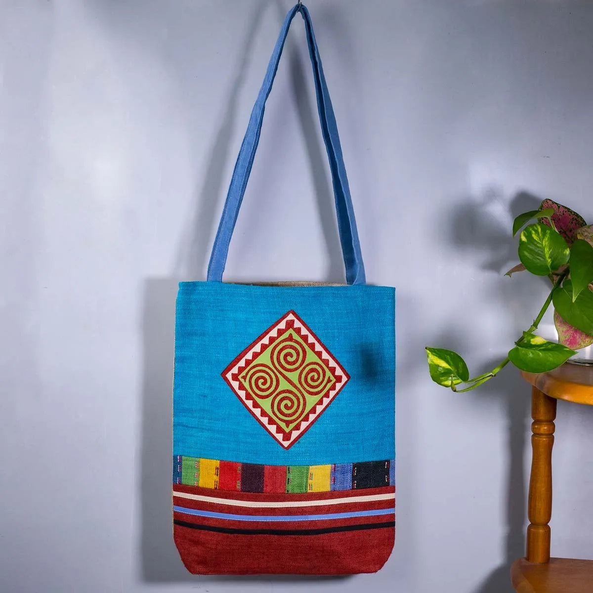 Vindigo tote bag blue hemp spiral patch full front hanging view