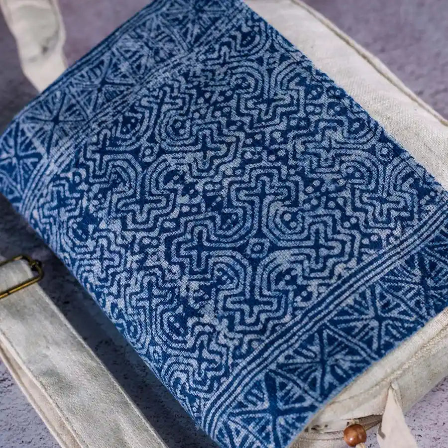 Vindigo indigo batik flap close-up with Hmong geometric pattern