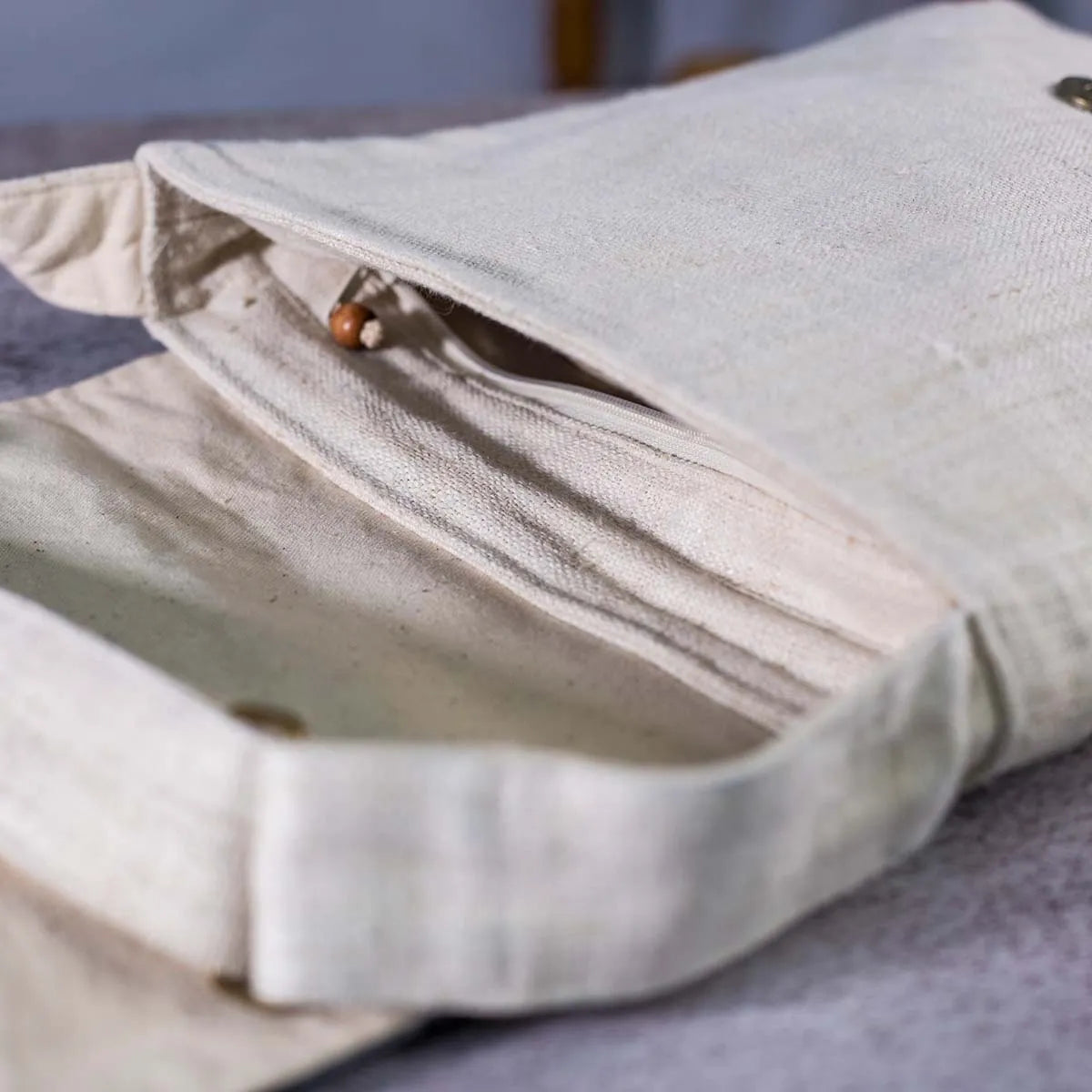 Vindigo natural hemp crossbody bag open view showing interior pocket