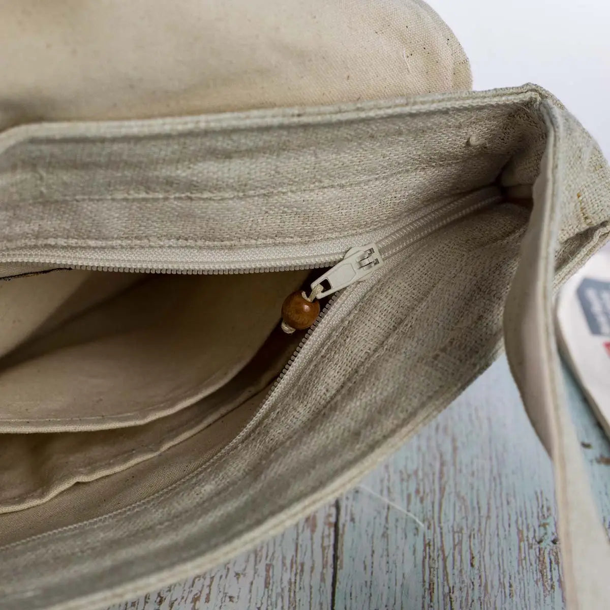 Vindigo hemp crossbody bag inside pocket view with brass zipper