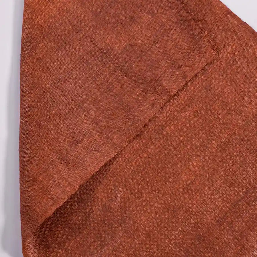Vindigo plain orange hemp fabric showing texture details