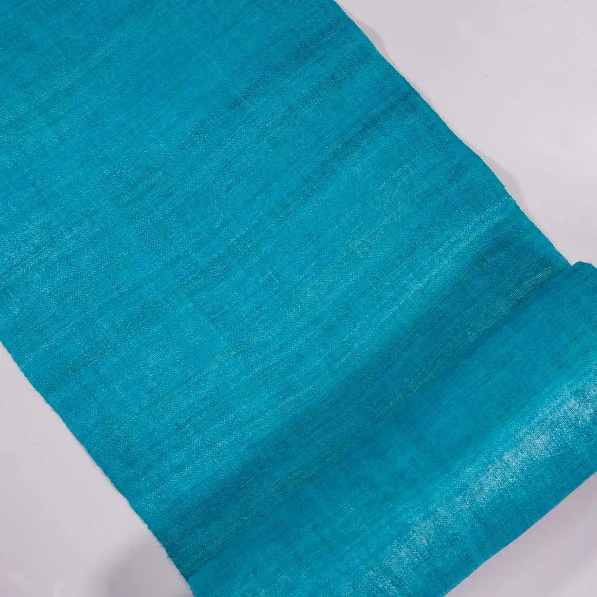 Vindigo turquoise hemp roll unrolled showing smooth texture