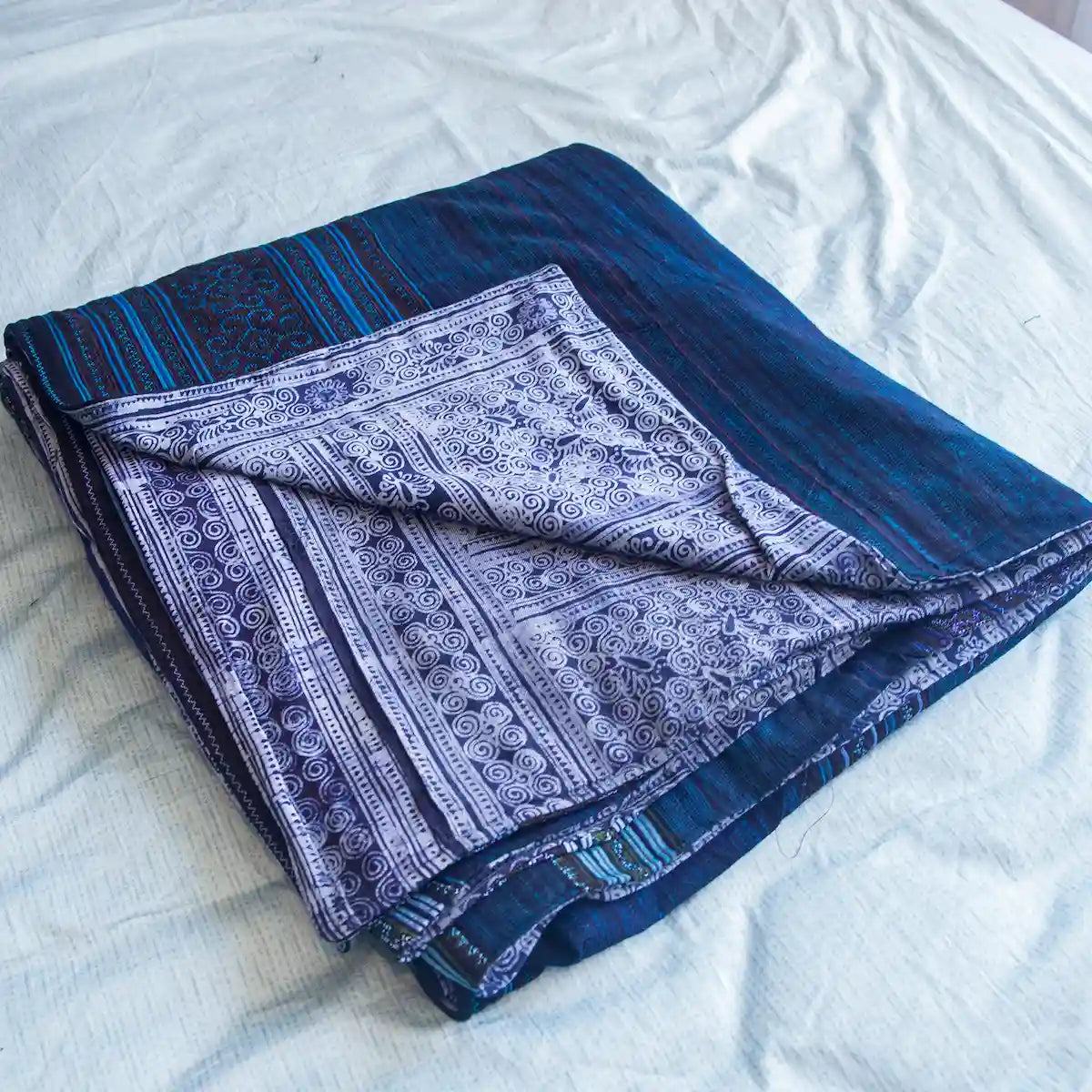 Vindigo dual-sided indigo cotton bed cover folded with Hmong pattern