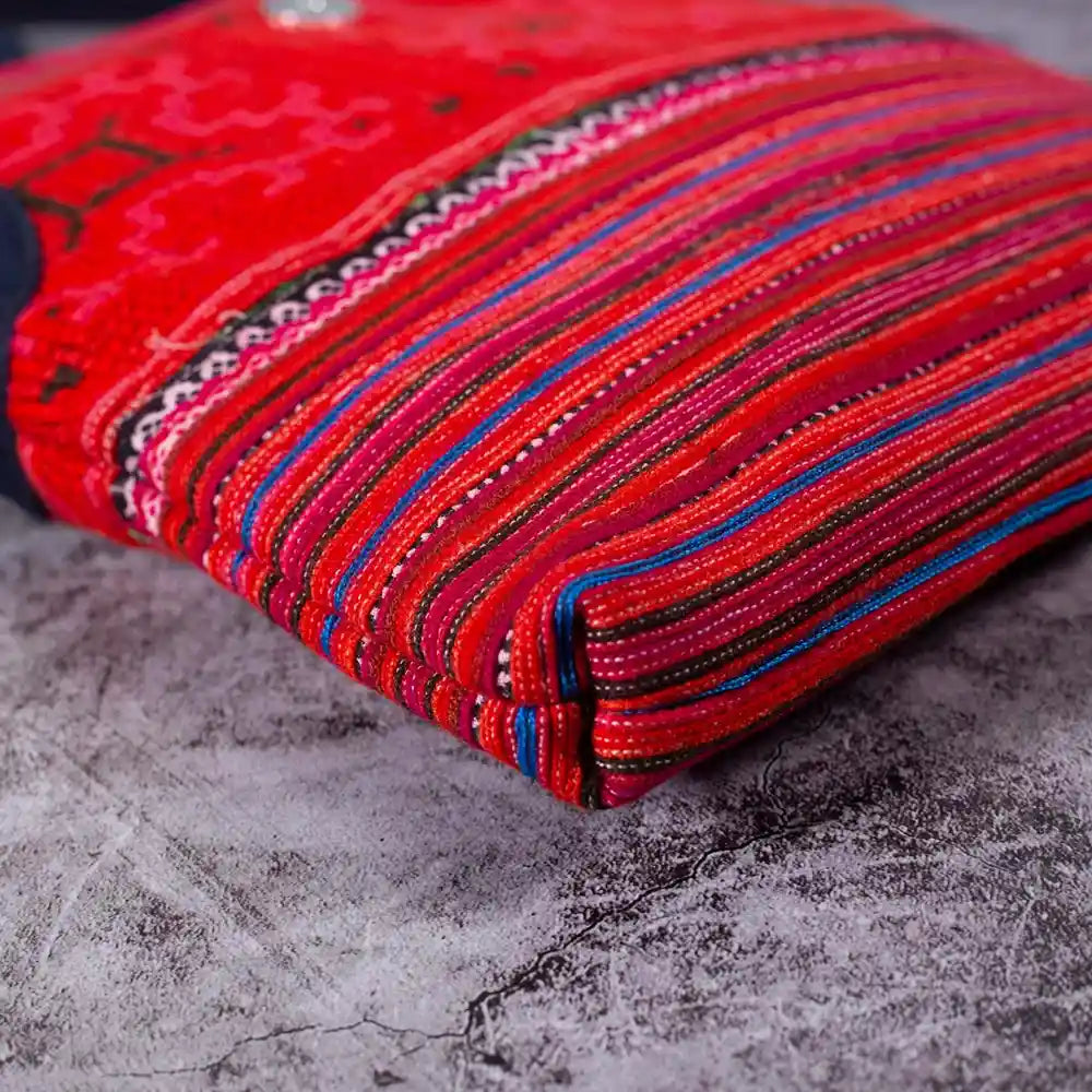 Vindigo red hemp crossbody bag bottom view showing detailed woven pattern