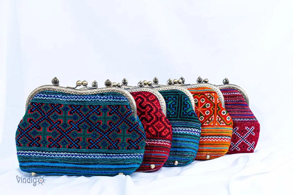 Vindigo collection of vintage embroidered handbags in blue, red, and orange