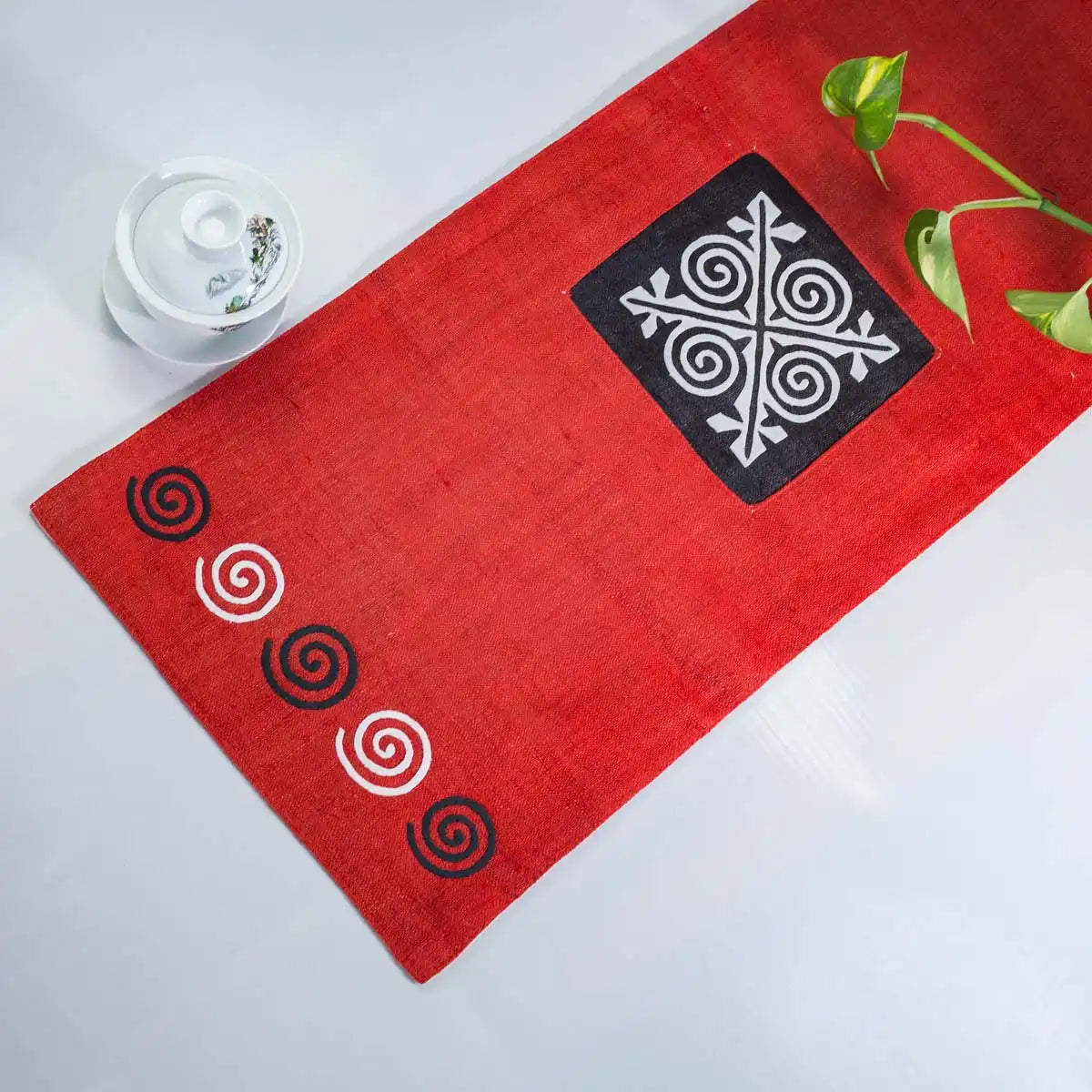 Vindigo red hemp table runner full layout showing spiral motifs and central embroidery