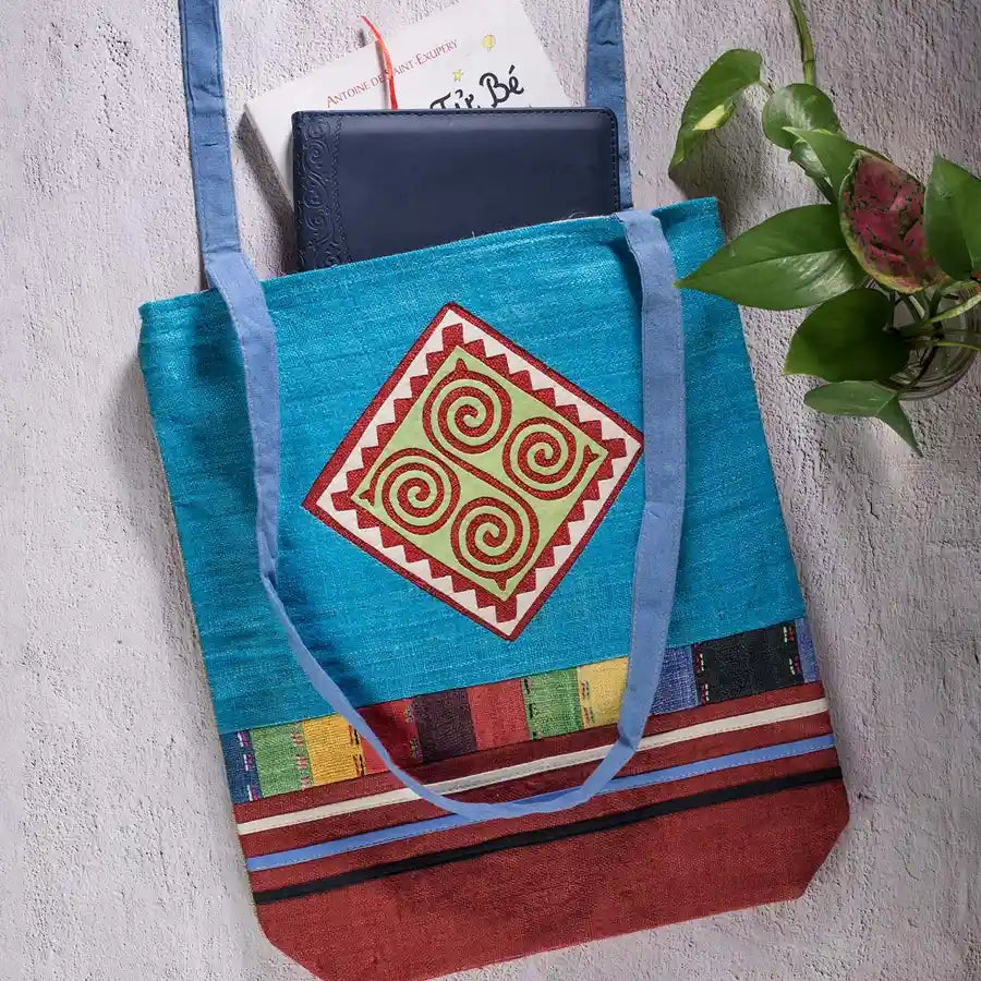 Vindigo tote bag blue hemp hand-embroidered spiral patch front angle