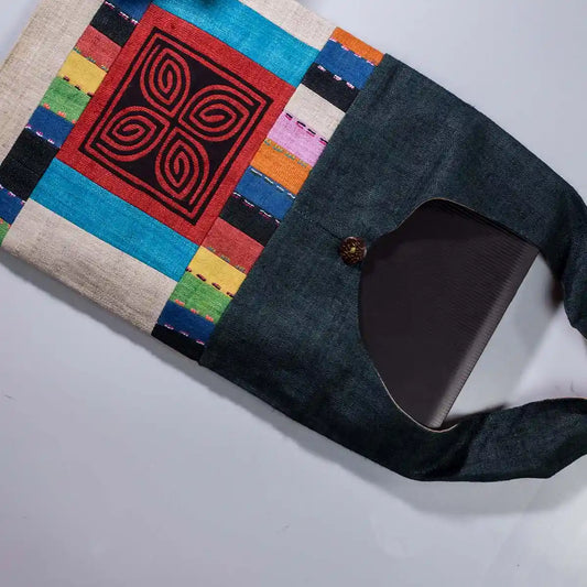 Vindigo shoulder bag teal hemp red spiral embroidery front angle view