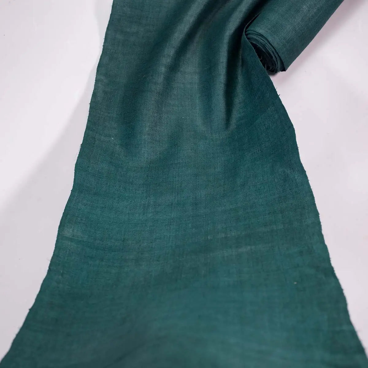 Vindigo dark green hemp fabric roll fully extended