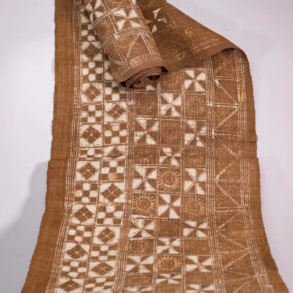 Vindigo brown ethnic geometric fabric roll folded upright view