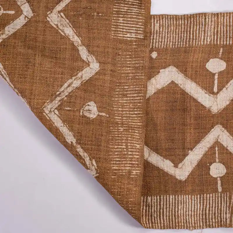 Vindigo brown tribal zigzag fabric roll close-up texture view