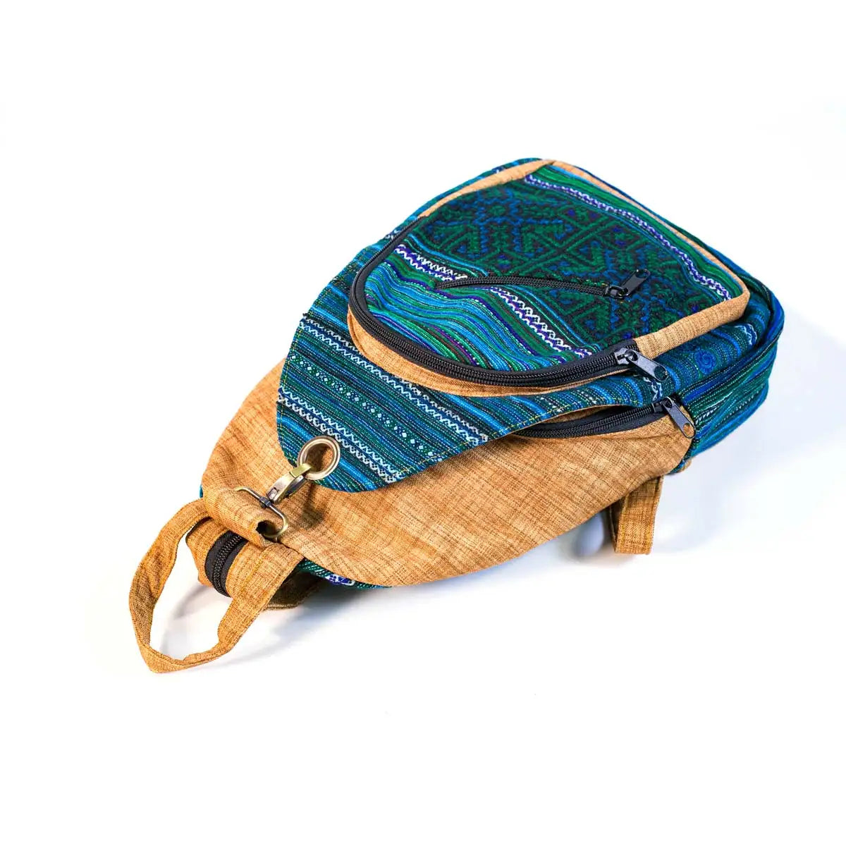 Vindigo handcrafted blue sling backpack side angle with embroidery
