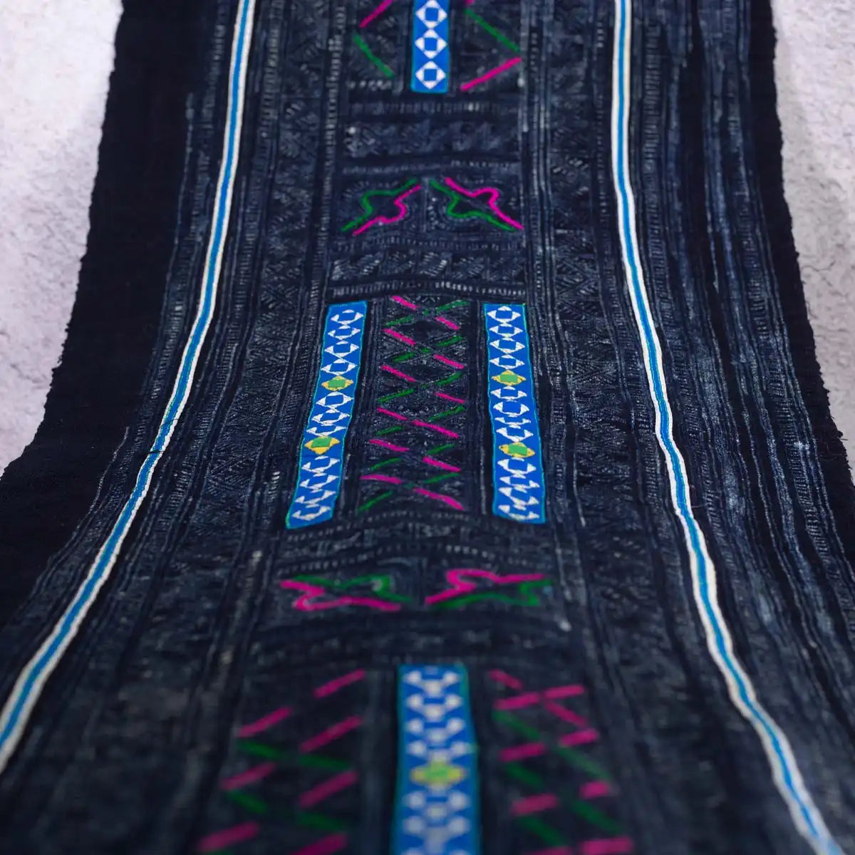 Vindigo vintage Hmong embroidered fabric roll top-down layout