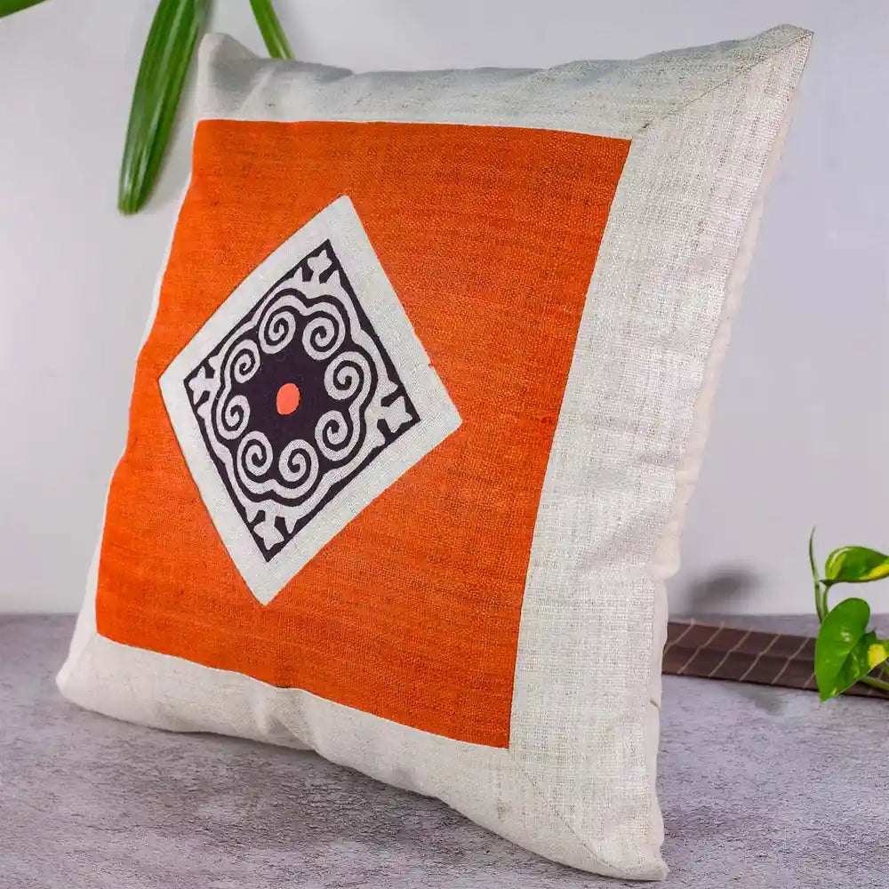 Vindigo tribal orange hemp cushion cover side view with diamond patchwork