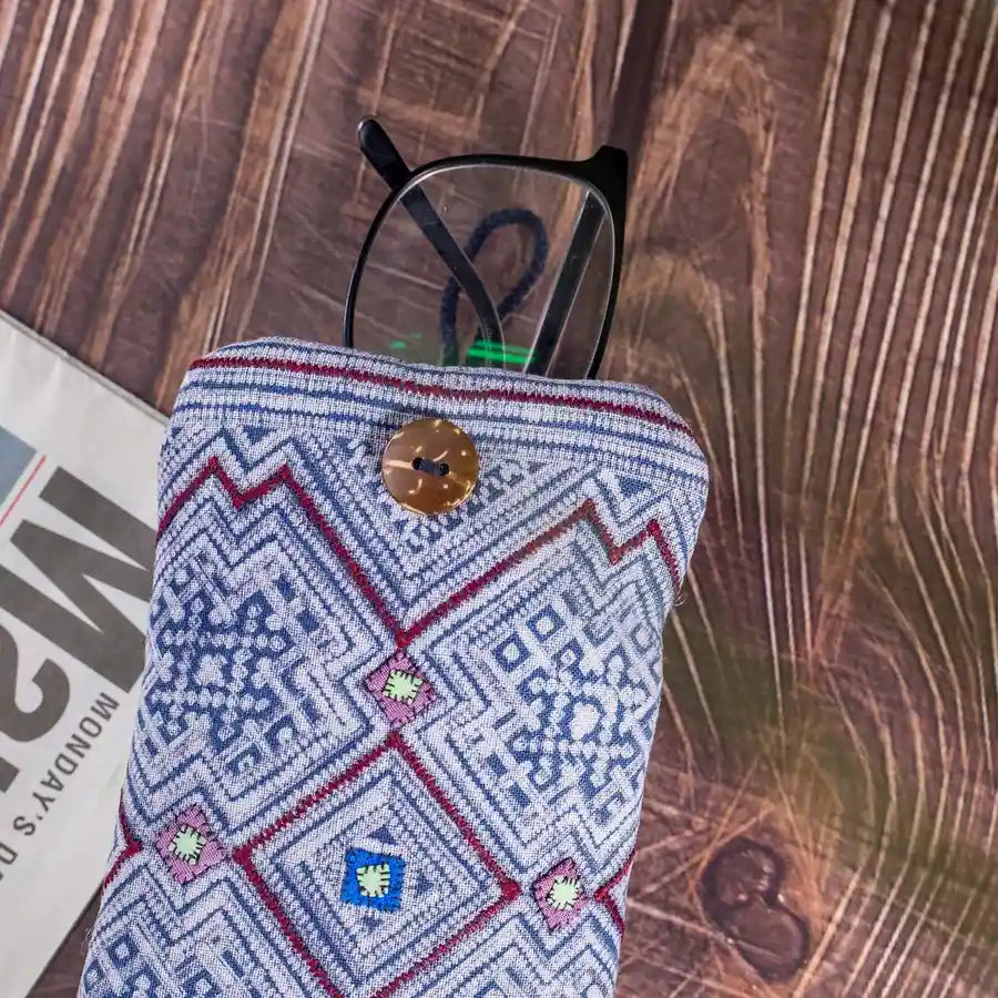 Vindigo embroidered phone case with loop closure open