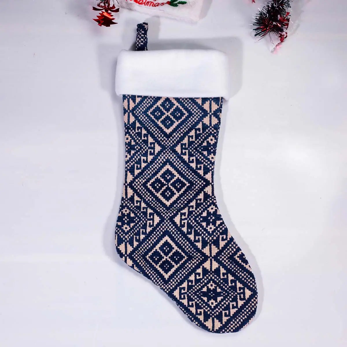Vindigo blue geometric embroidered Christmas stocking front view