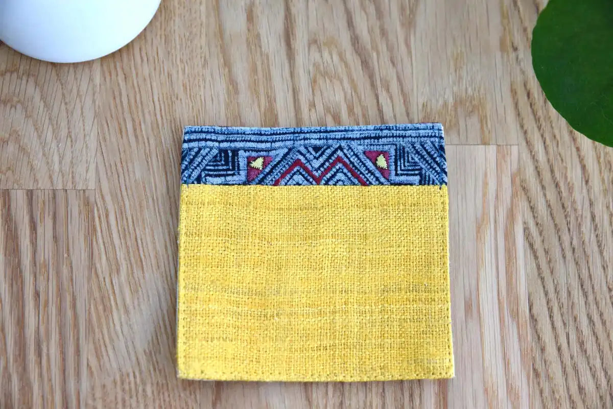 Detailed shot of handmade indigo fabric pattern on hemp coaster
