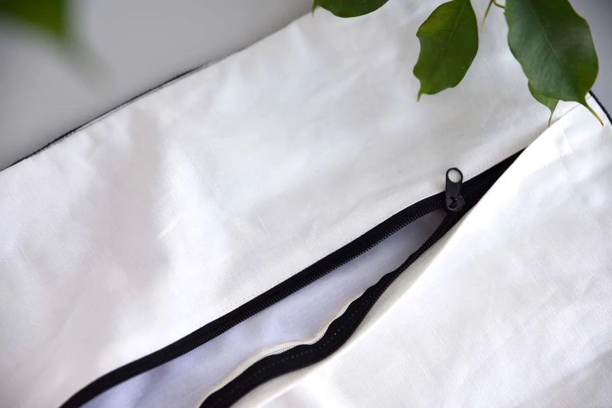 Zipper detail of indigo hemp cushion cover showing neat finishing