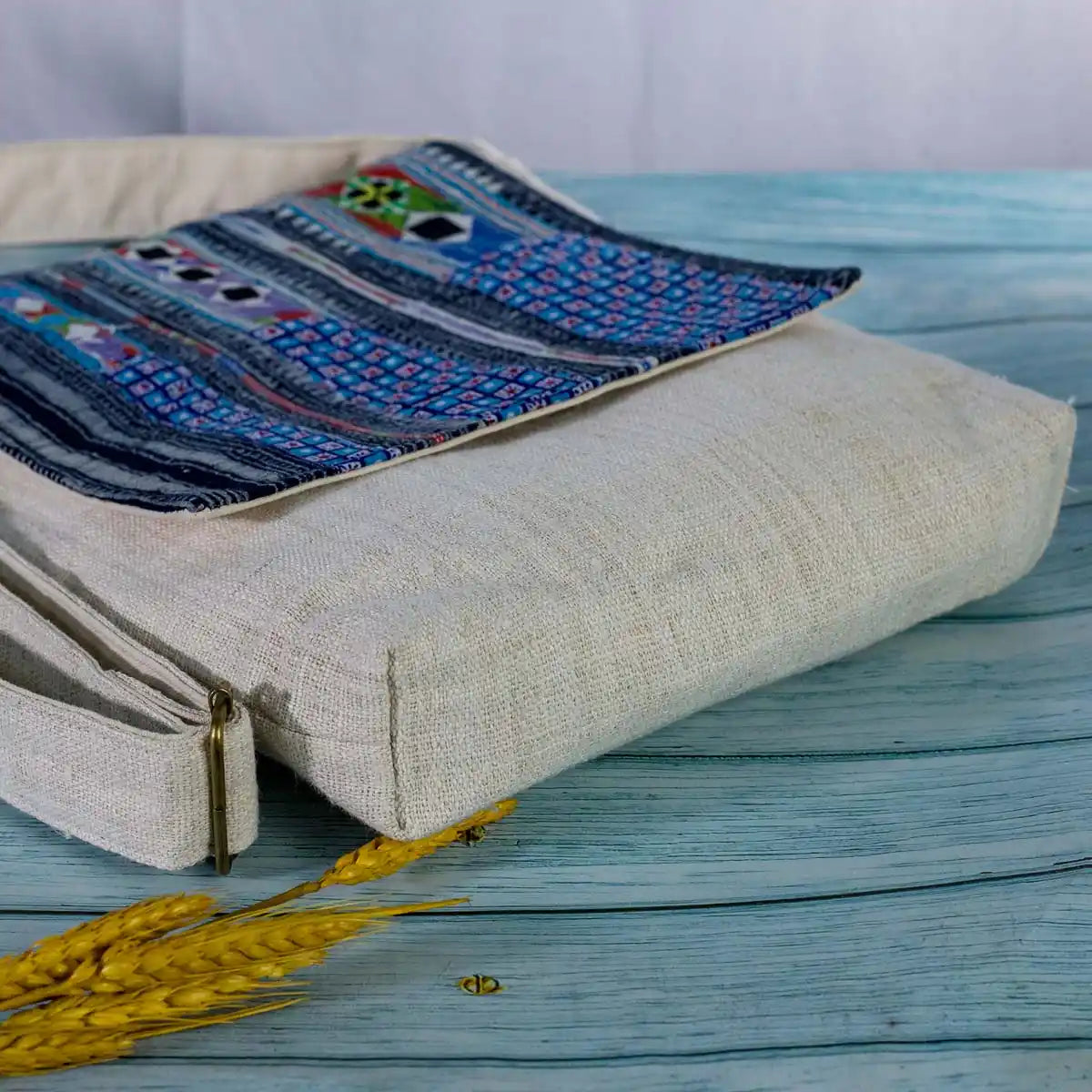 Vindigo blue hemp crossbody bag folded view showing batik fabric flap