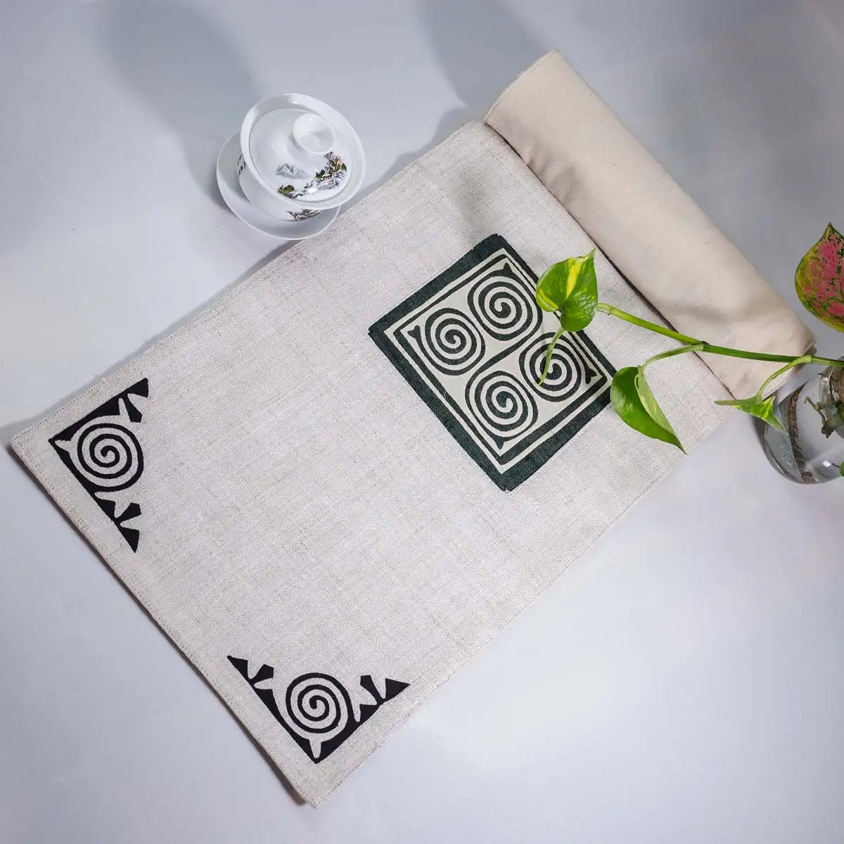 Vindigo beige hemp table runner full layout with black spirals and central motif