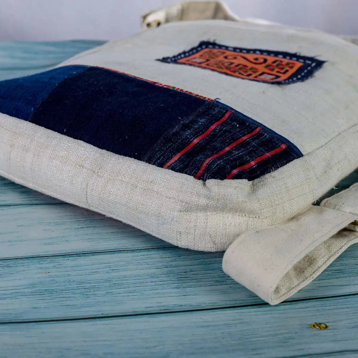 Vindigo beige hemp crossbody bag lifestyle close-up with tribal embroidery