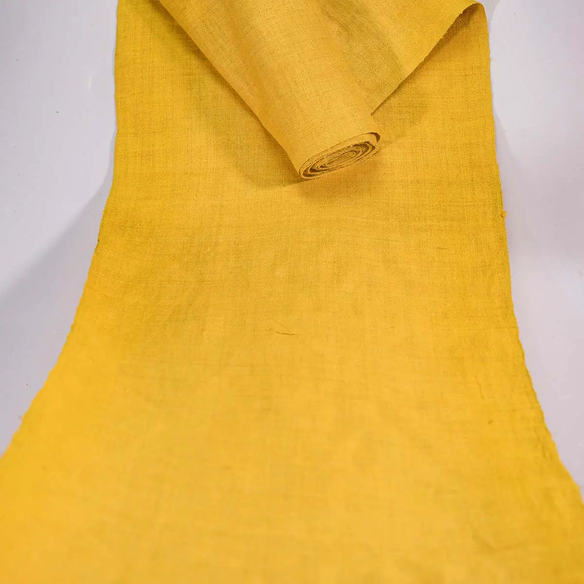 Vindigo plain yellow hemp fabric roll extended full length