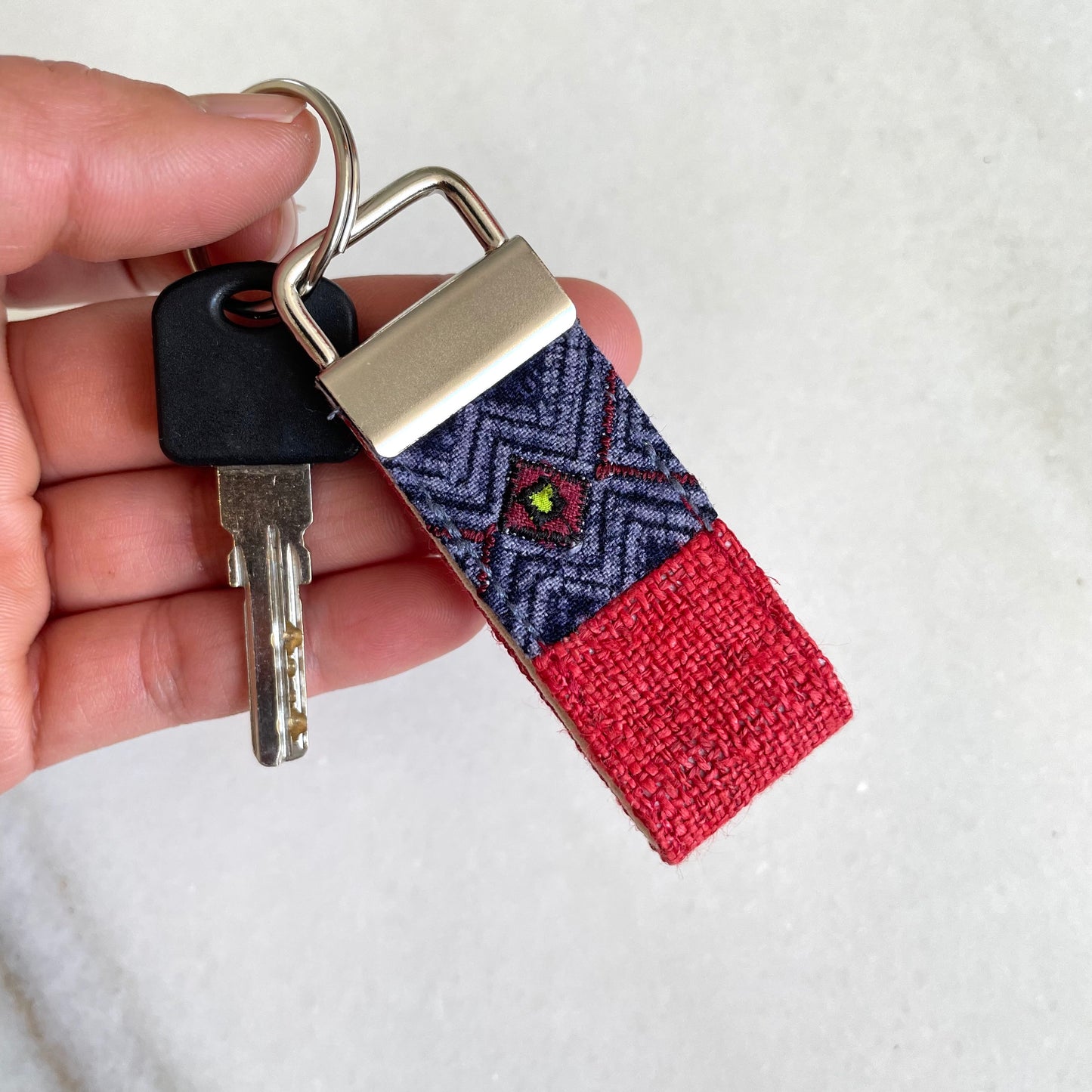 Red hemp fabric keychain with vintage batik patch, stainless metal key fob