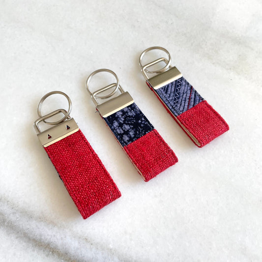 Red hemp fabric keychain with vintage batik patch, stainless metal key fob