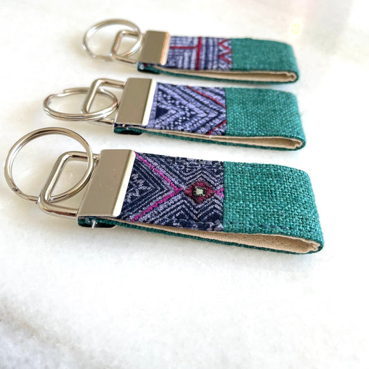 Emerald green hemp fabric keychain with vintage batik patch, stainless metal key fob