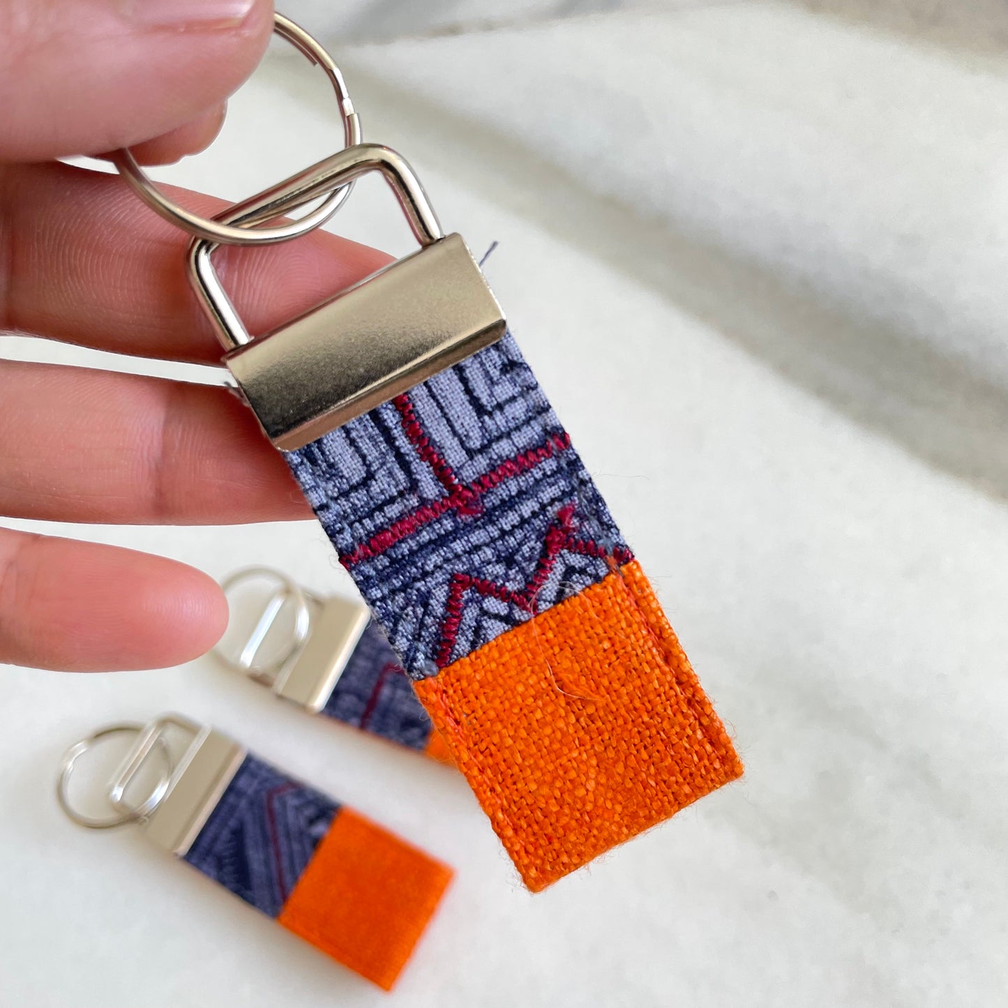 Orange hemp fabric keychain with vintage batik patch, stainless metal key fob