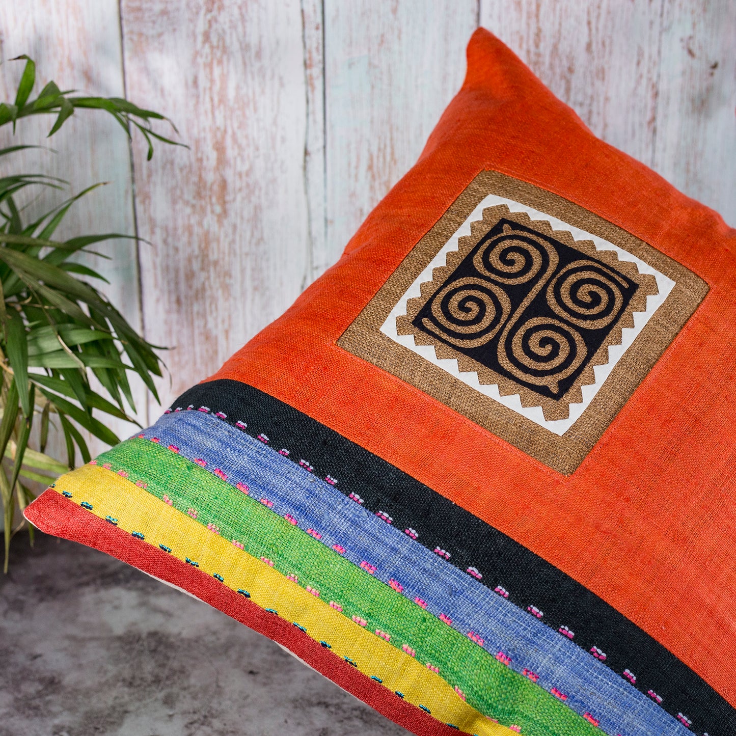 Orange Hemp Cushion Cover with stripes in different colors, hand-stitched pattern in black and brown