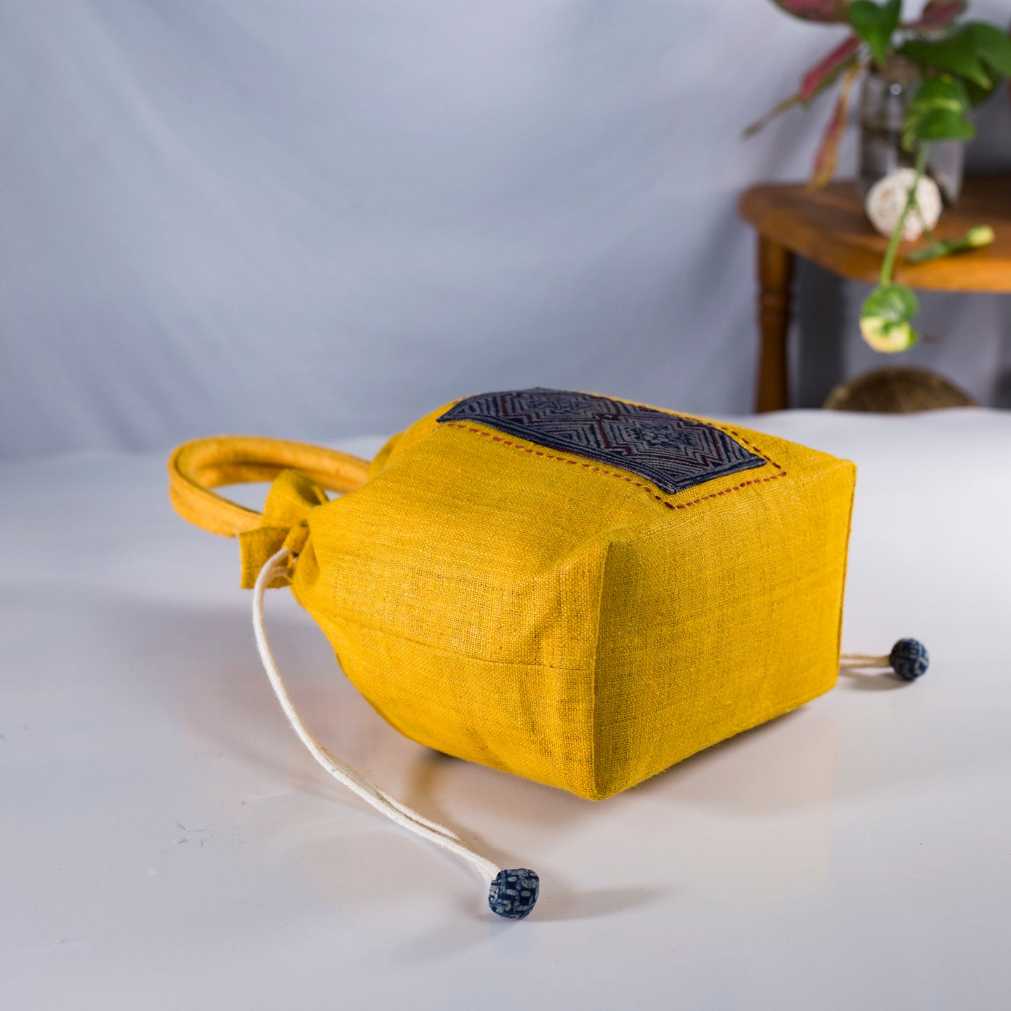 Yellow drawstring hemp handbag, natural hemp and batik patch