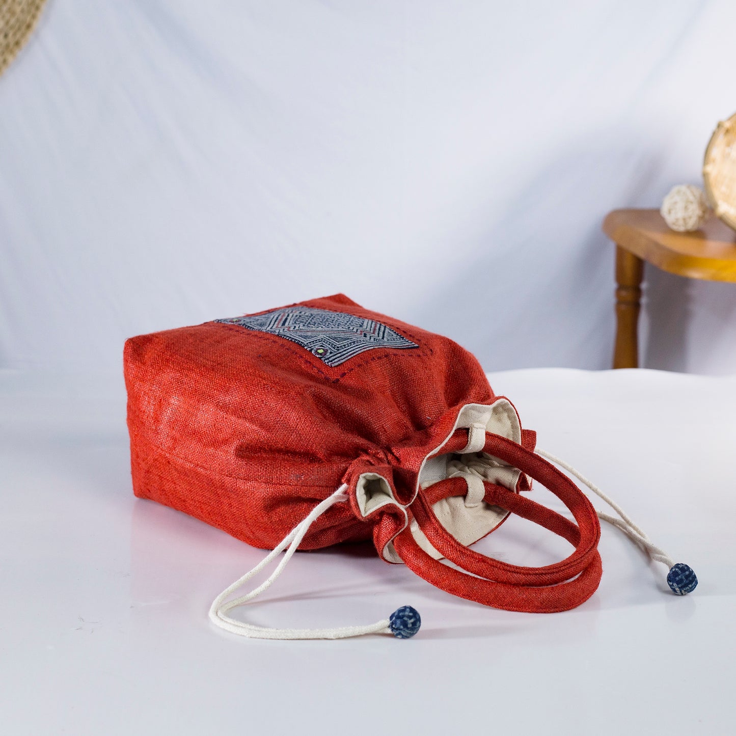 Red drawstring hemp handbag, natural hemp and batik patch
