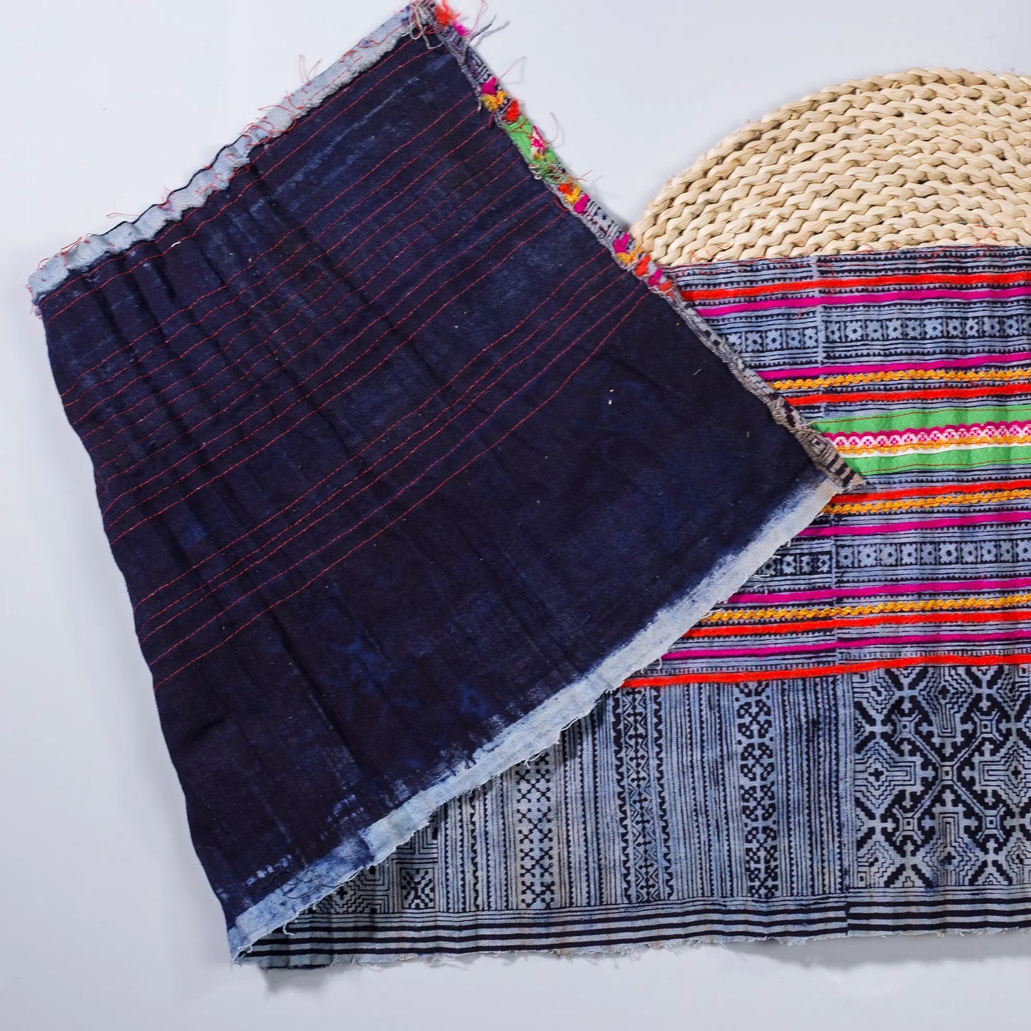 Vintage indigo rolls with pink and red stripes, block print patterns