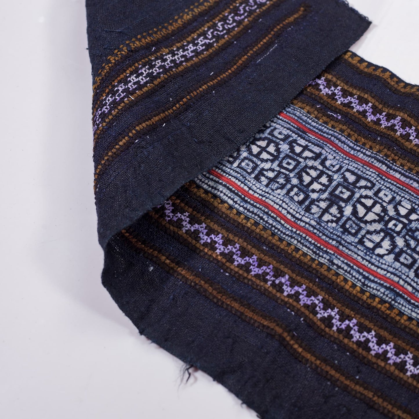 Vintage batik and embroidery roll