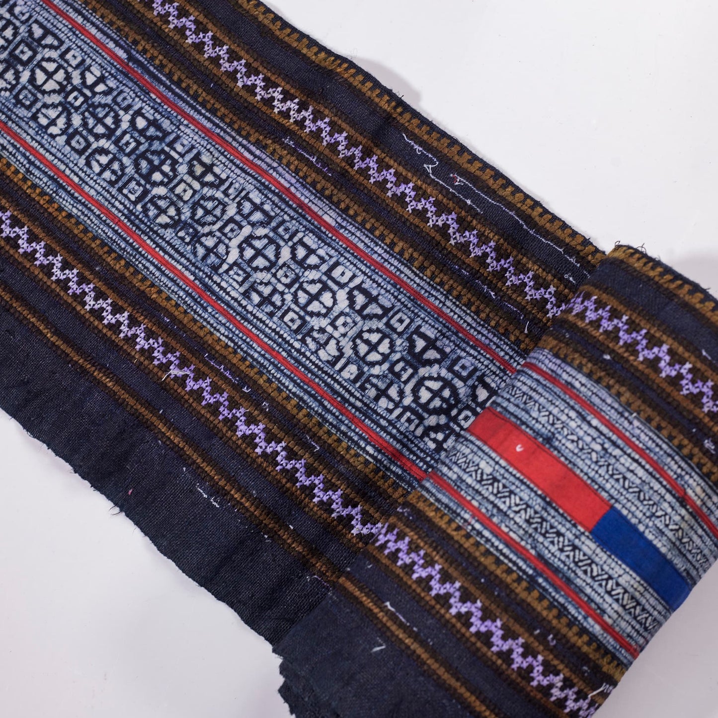 Vintage batik and embroidery roll