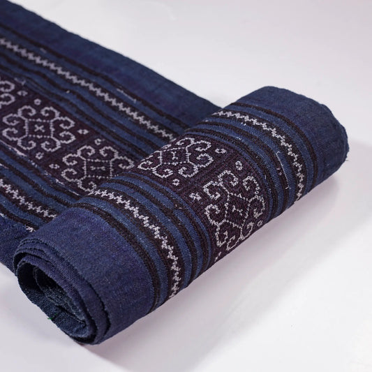 Vintage cross-stitch embroidery roll in flowery pattern