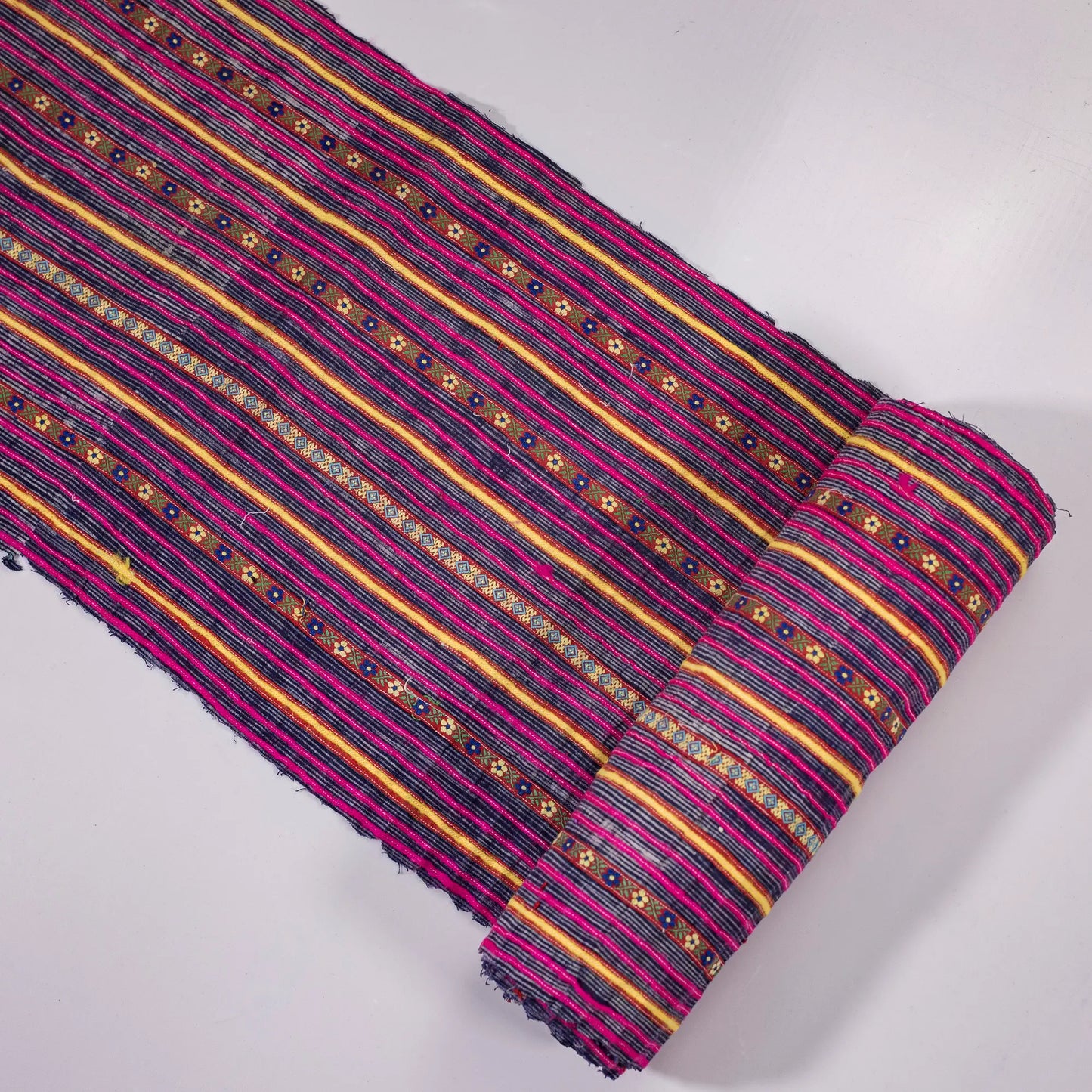 Vintage indigo rolls with pink stripes and tiny embroidery details