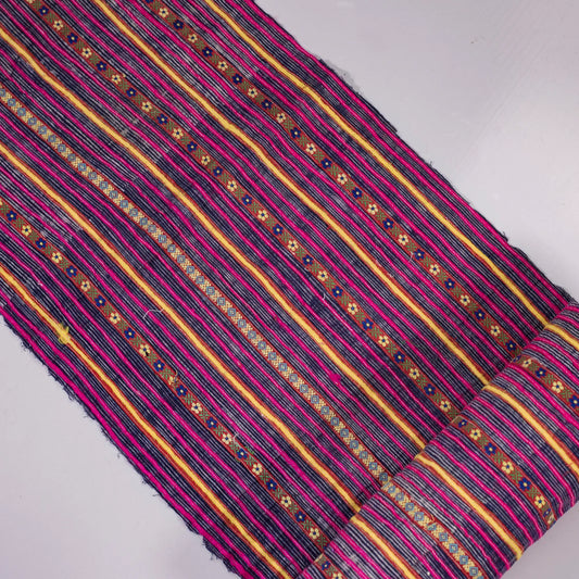 Vintage indigo rolls with pink stripes and tiny embroidery details