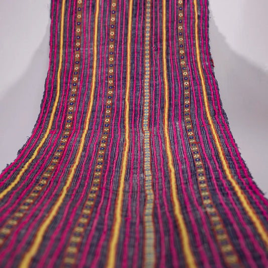 Vintage indigo rolls with pink stripes and tiny embroidery details