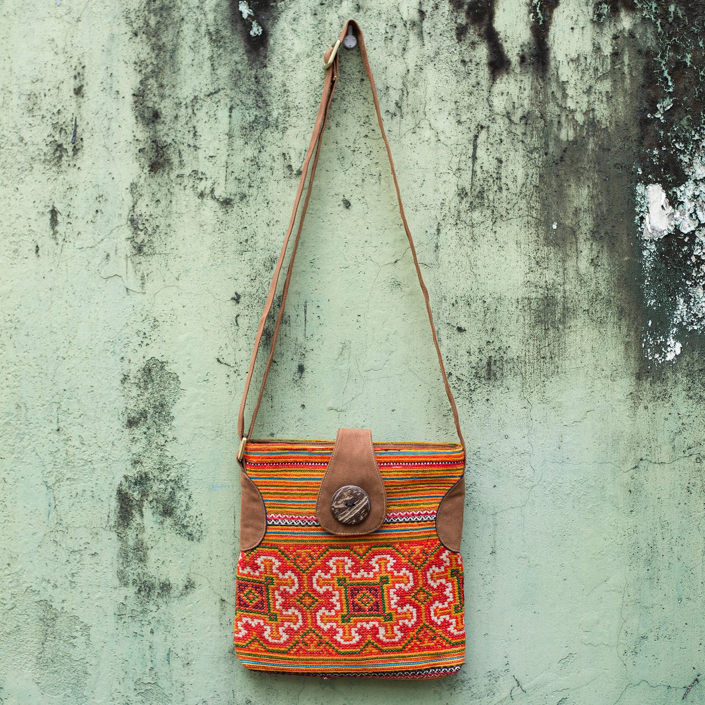 Flowery pattern, Orange embroidery cross-body bag, faux leather straps, coconut button