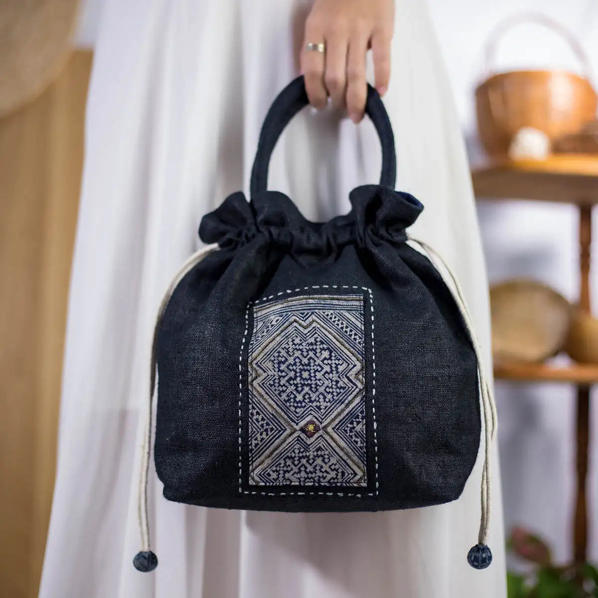 Black natural hemp bucket bag with handle and vintage H’Mong patch, handmade sustainable fashion