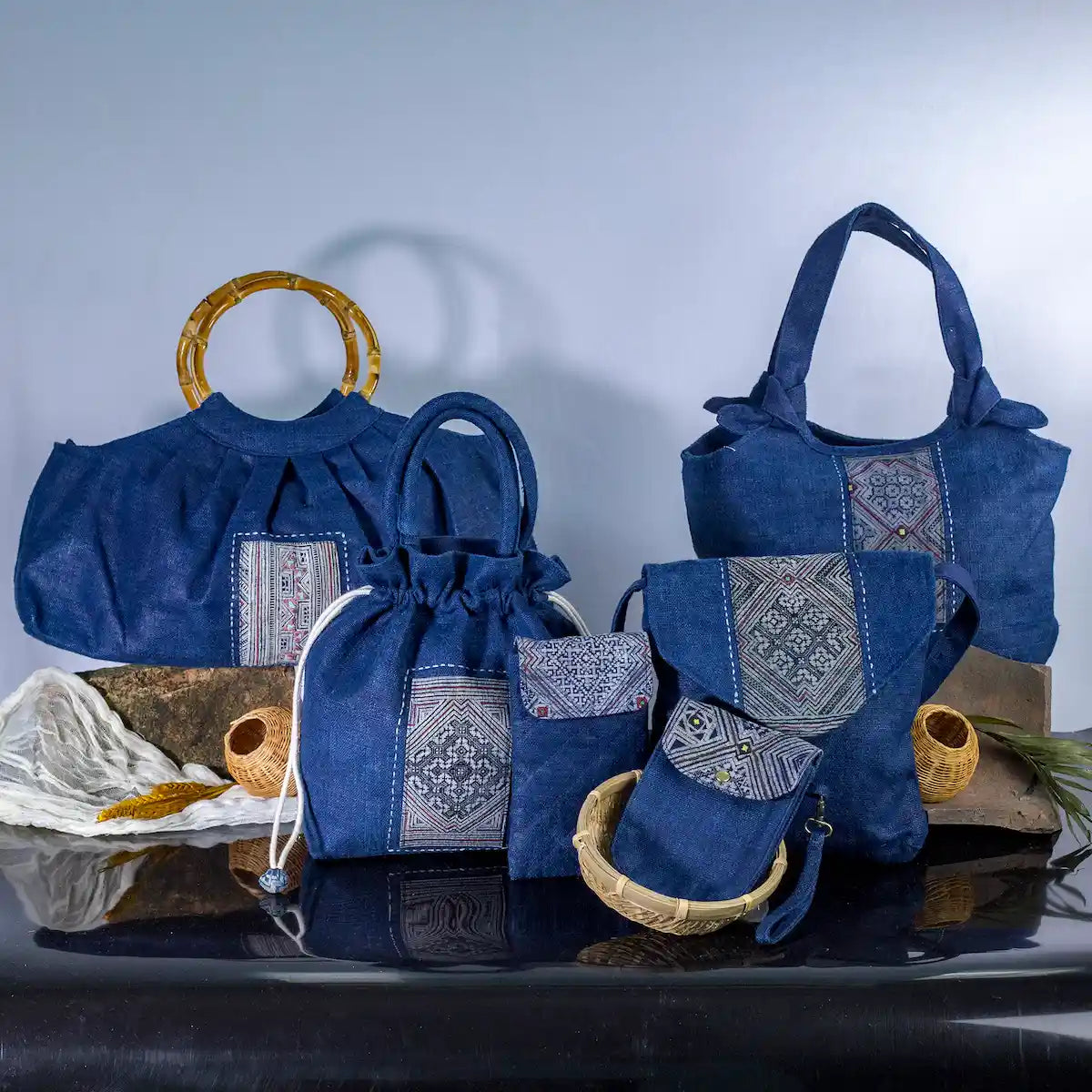 Set of indigo hemp bucket bags with H’mong patches, handcrafted eco-friendly handbags.