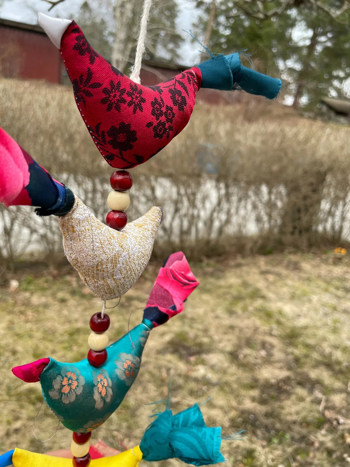 <tc>Fågelgirlang av handgjorda tribala tyger</tc>