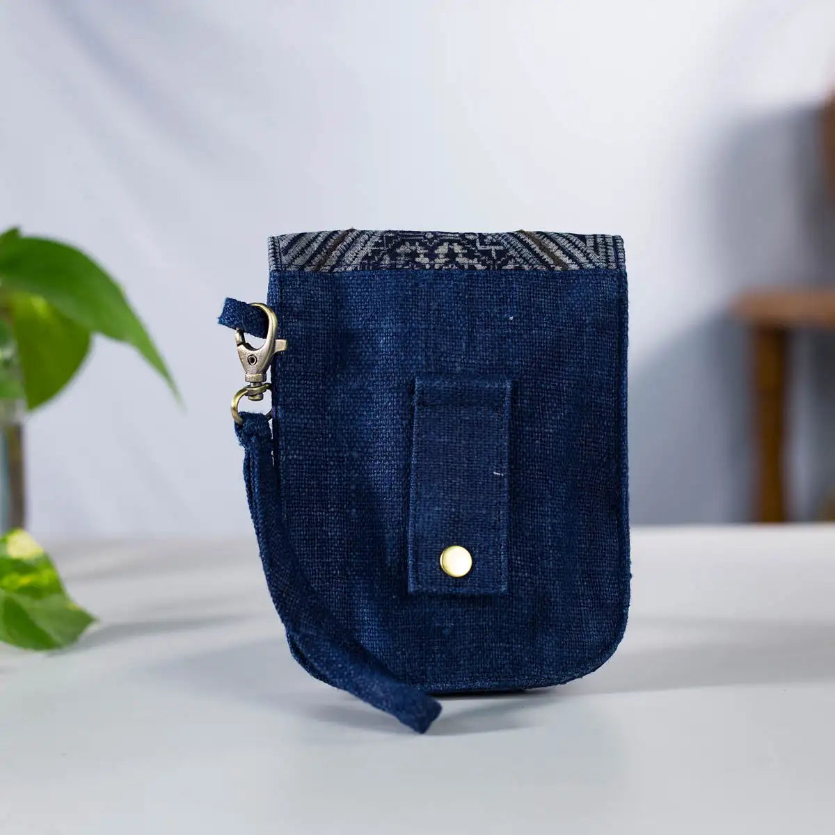 Indigo hemp mobilväska, handcrafted phone bag with H’mong patch, eco-friendly and artisan-made.